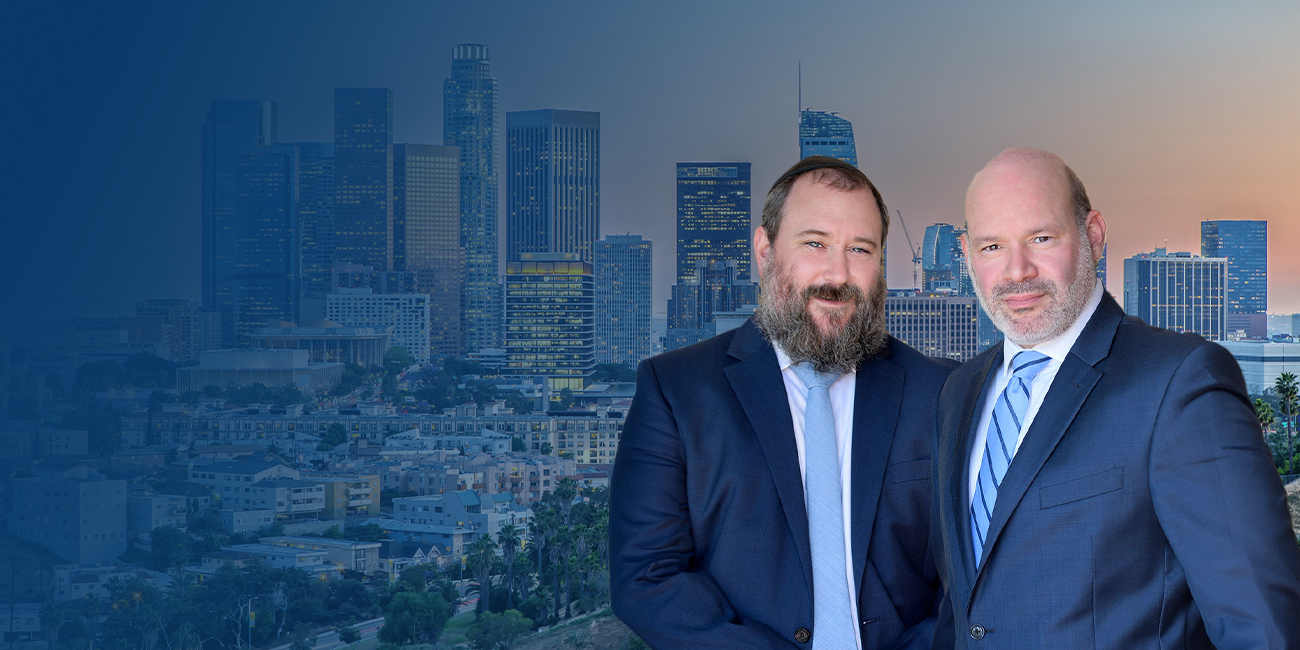 Attorneys and Los Angeles city at the background