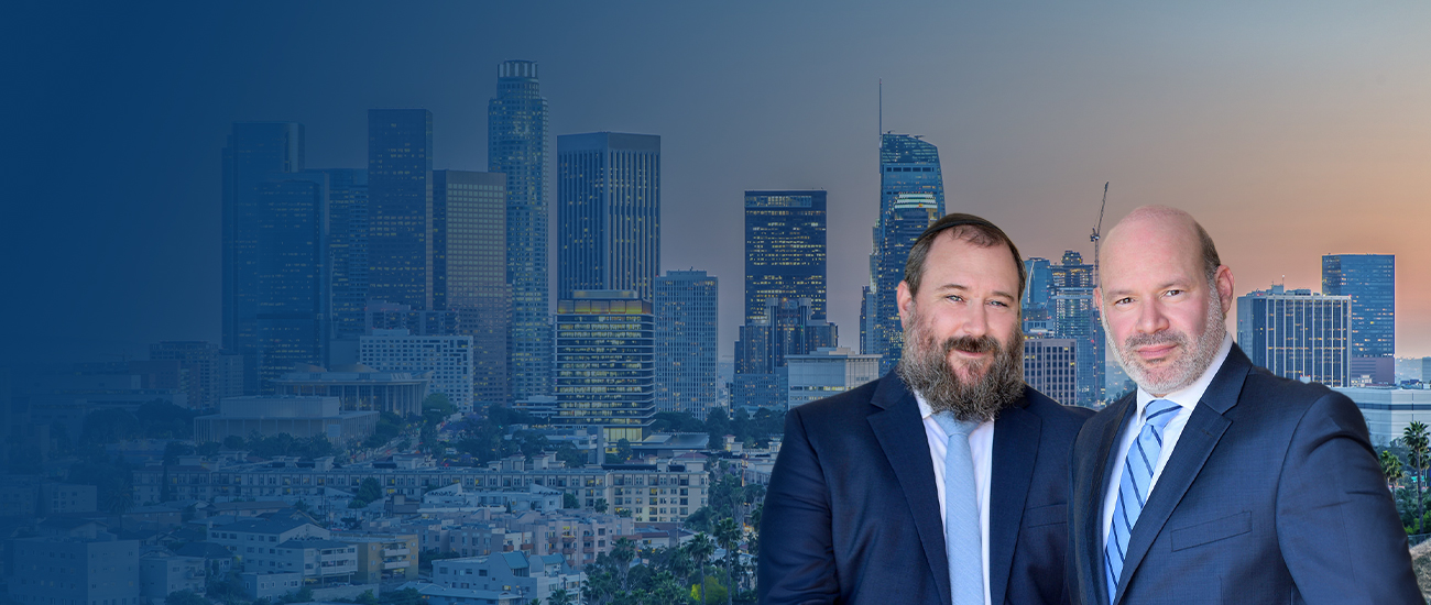 Attorneys and Los Angeles city at the background